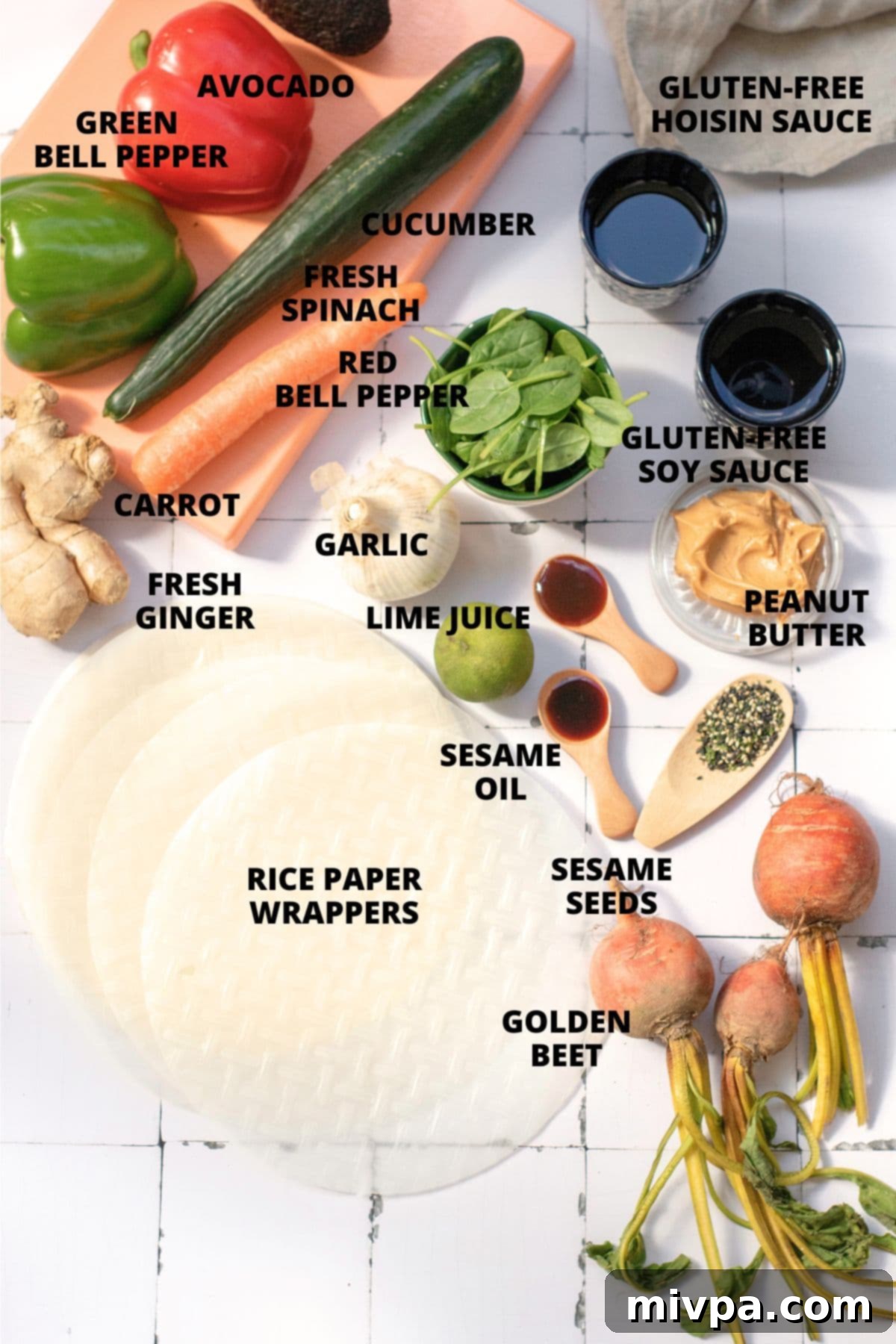 Ingredients for vegetarian summer rolls recipe laid out on board.