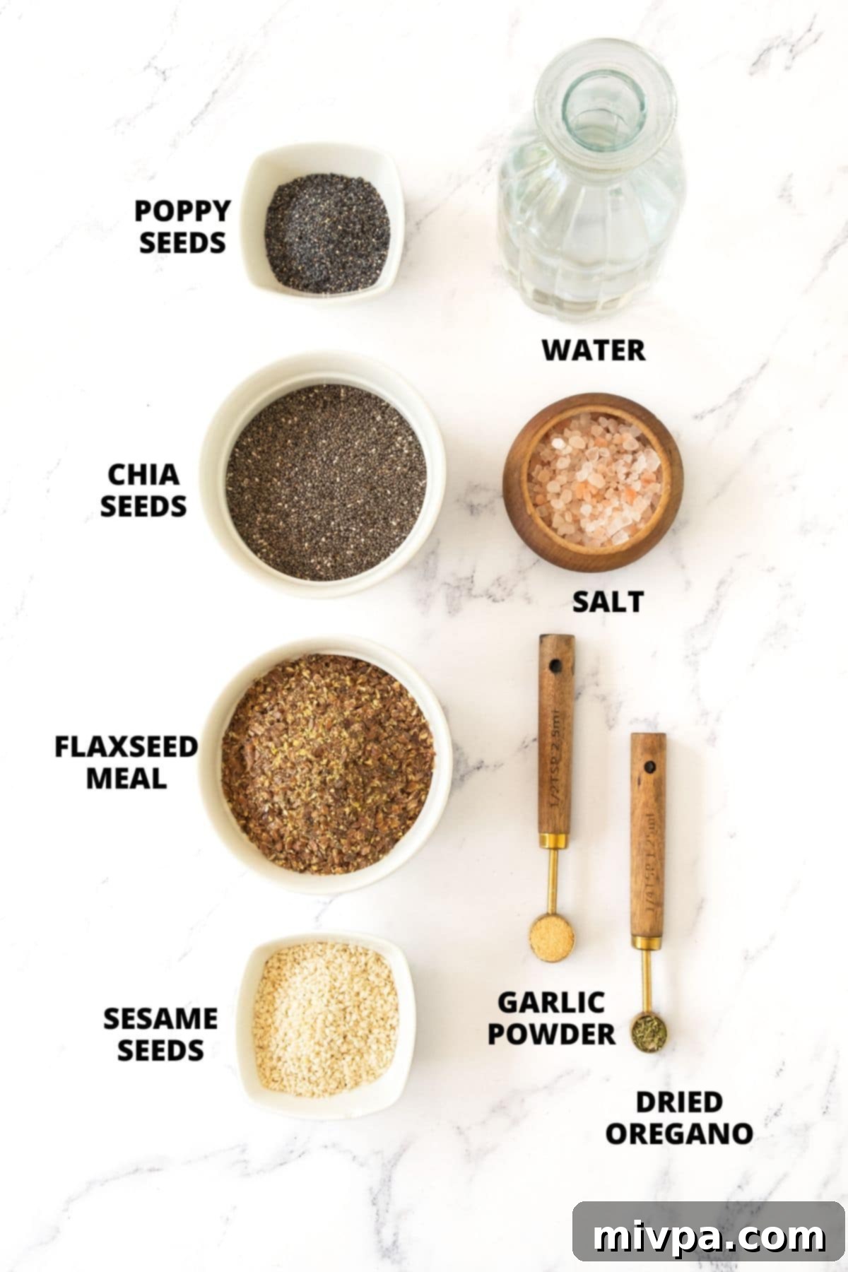 Flaxseed Crackers Recipe (Gluten-Free, Vegan) Ingredients A meticulously arranged flat lay of all the ingredients for the flaxseed crackers recipe on a rustic marble board.