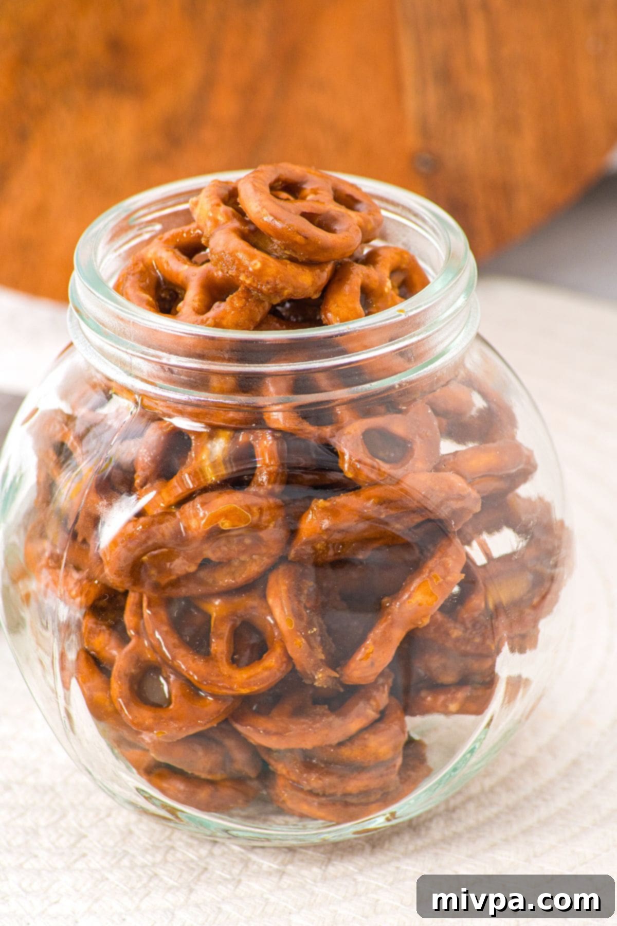 Crunchy Butter Toffee Pretzels (Gluten-Free, Dairy-Free Option) in Jar A charming glass jar filled with crunchy butter toffee pretzels, perfect for gifting or storage.