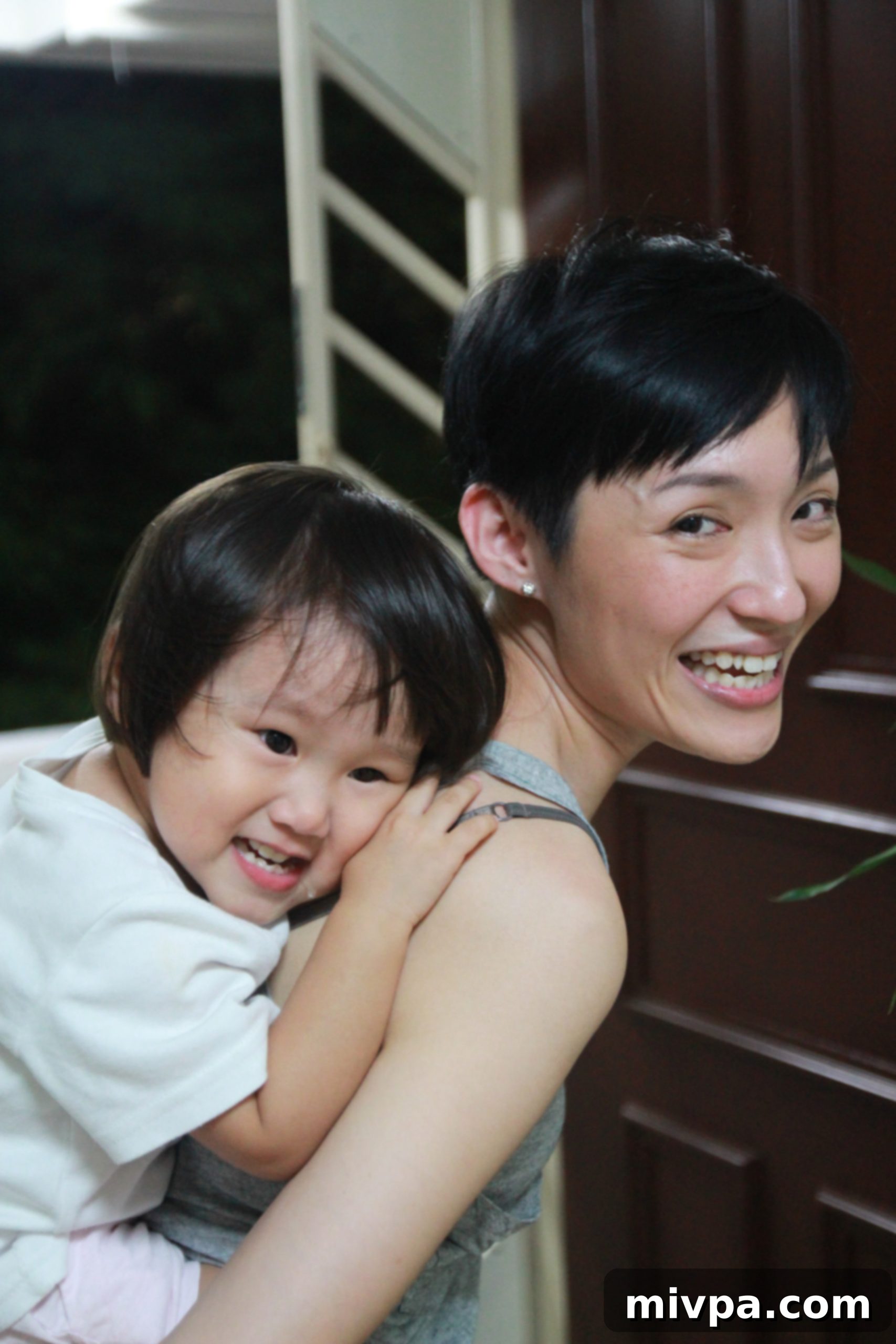 Family enjoying time with young En Tong