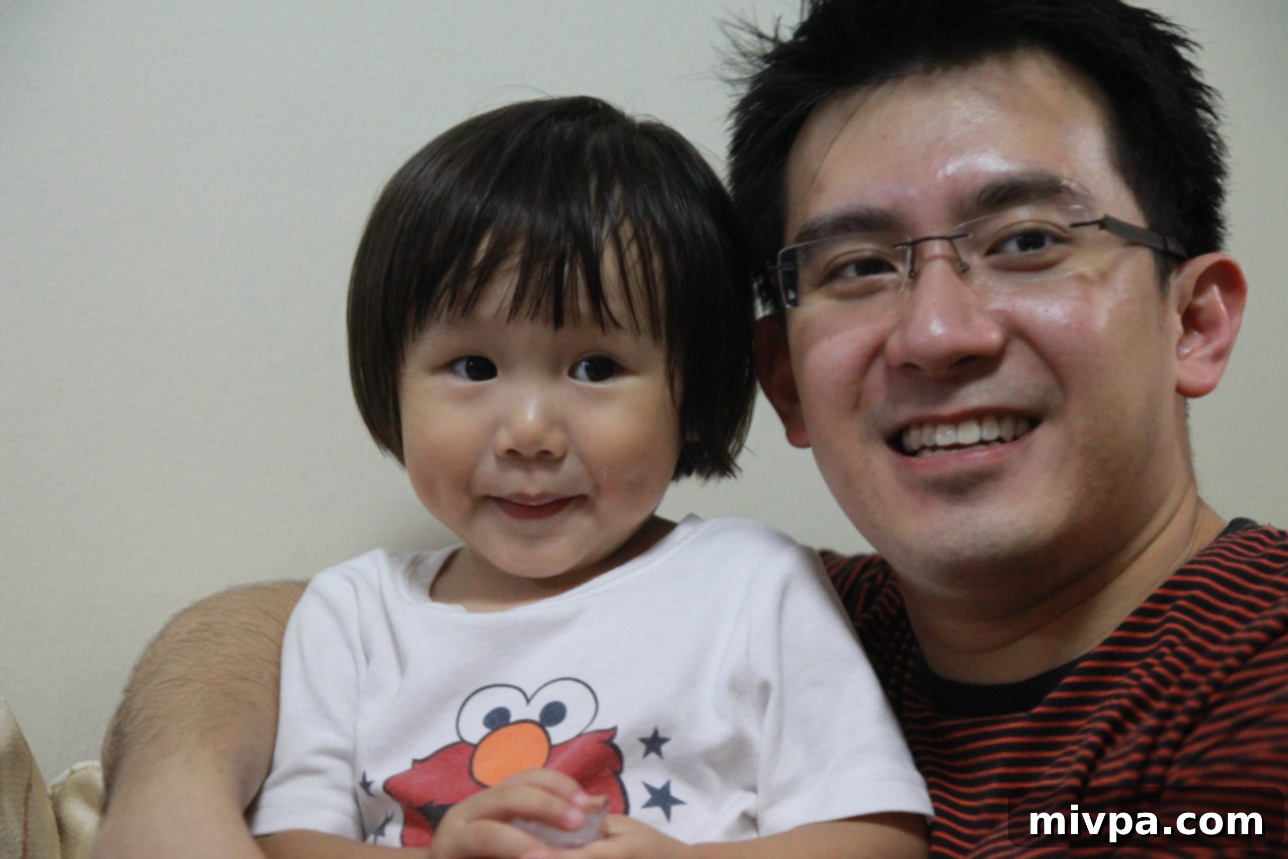 En Tong laughing during family gathering