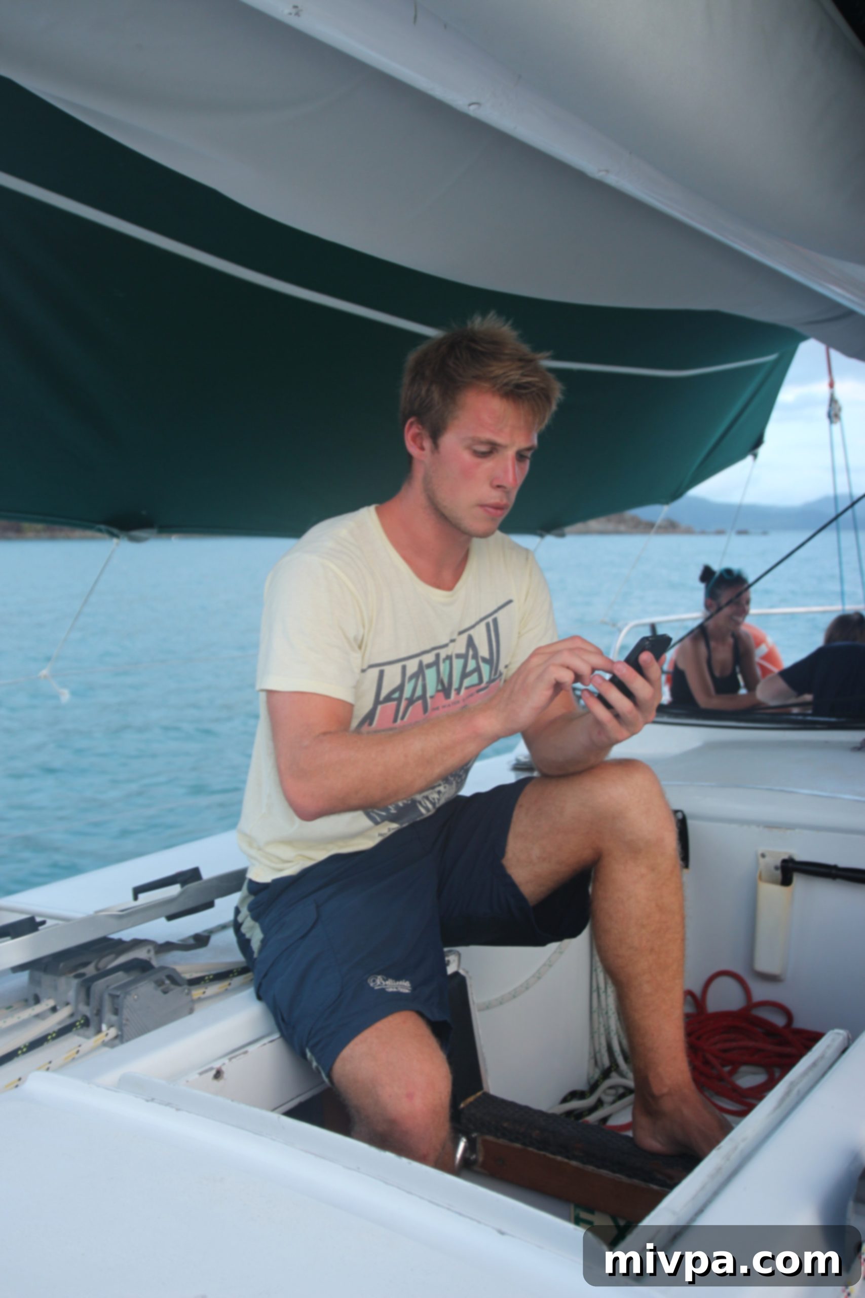 Tim, the talented deckhand and chef, preparing delicious food in the sailboat galley