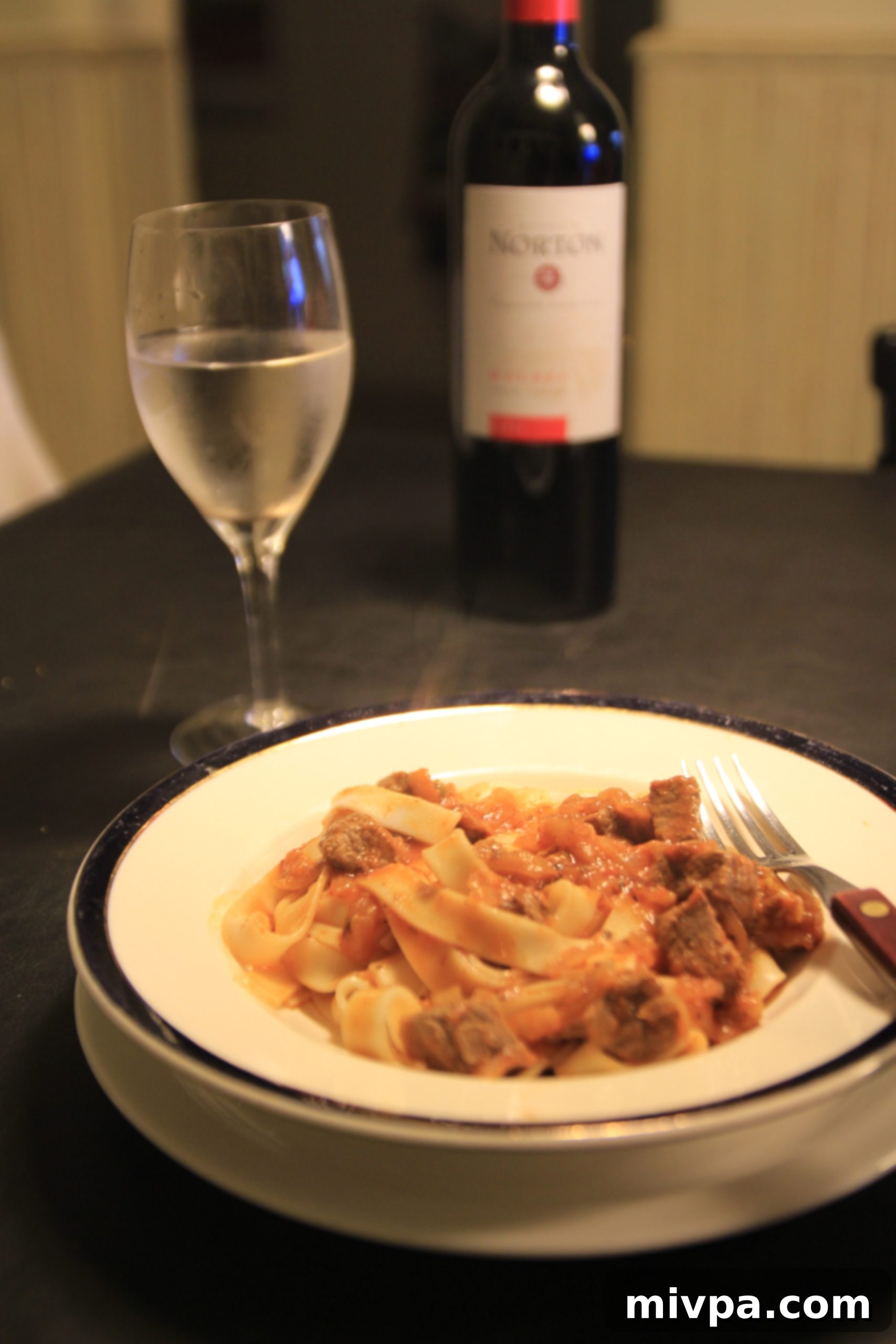 Plated stewed beef fettuccine