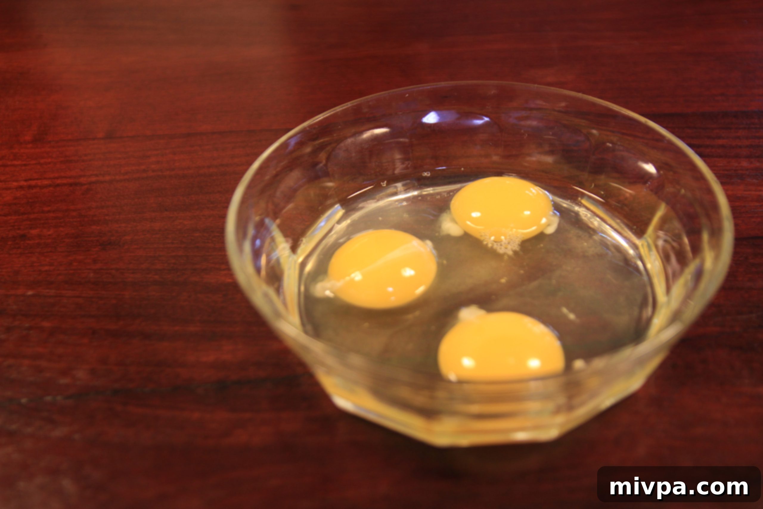 Porridge with a single egg added, hinting at simple comfort.