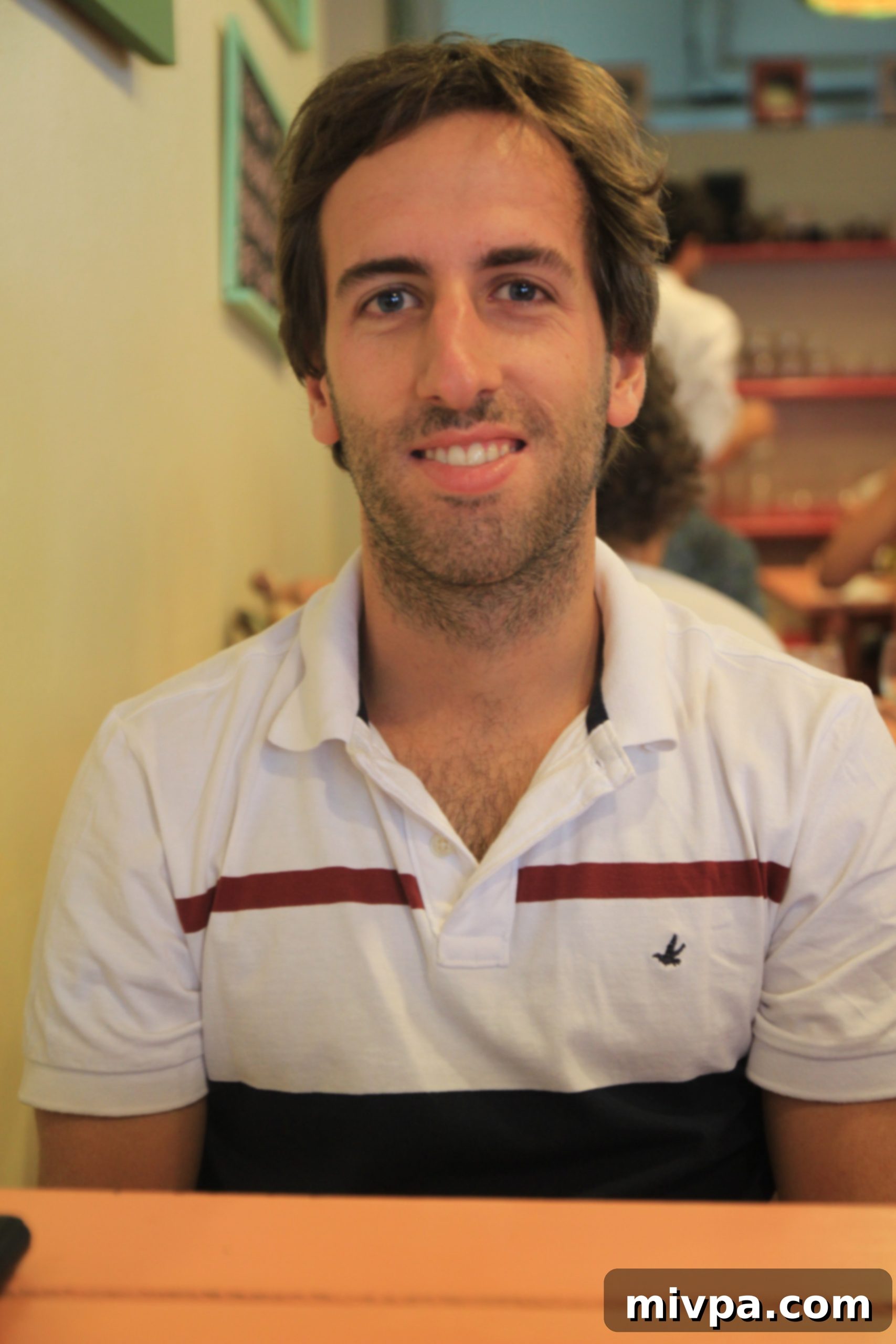 Happy person after a fulfilling brunch at Oui Oui Cafe