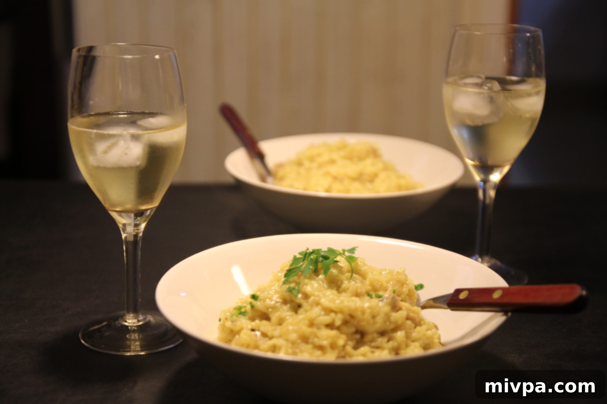 Chicken Saffron Risotto served on a plate, garnished with parsley