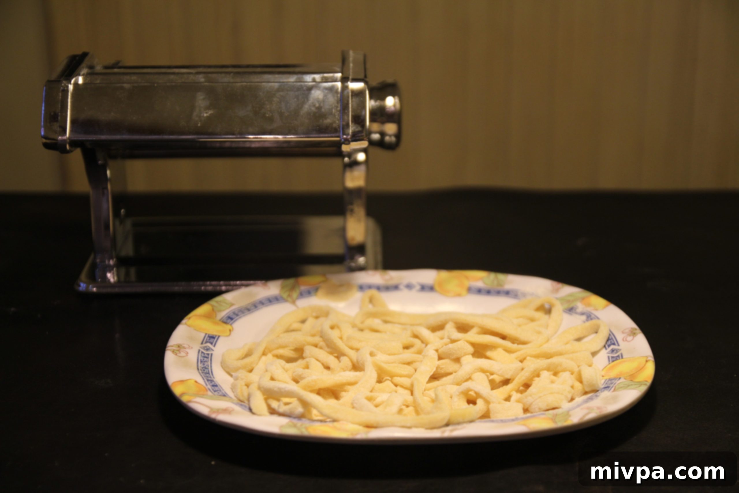 Freshly made pasta dough, rolled out and ready for the pasta machine.
