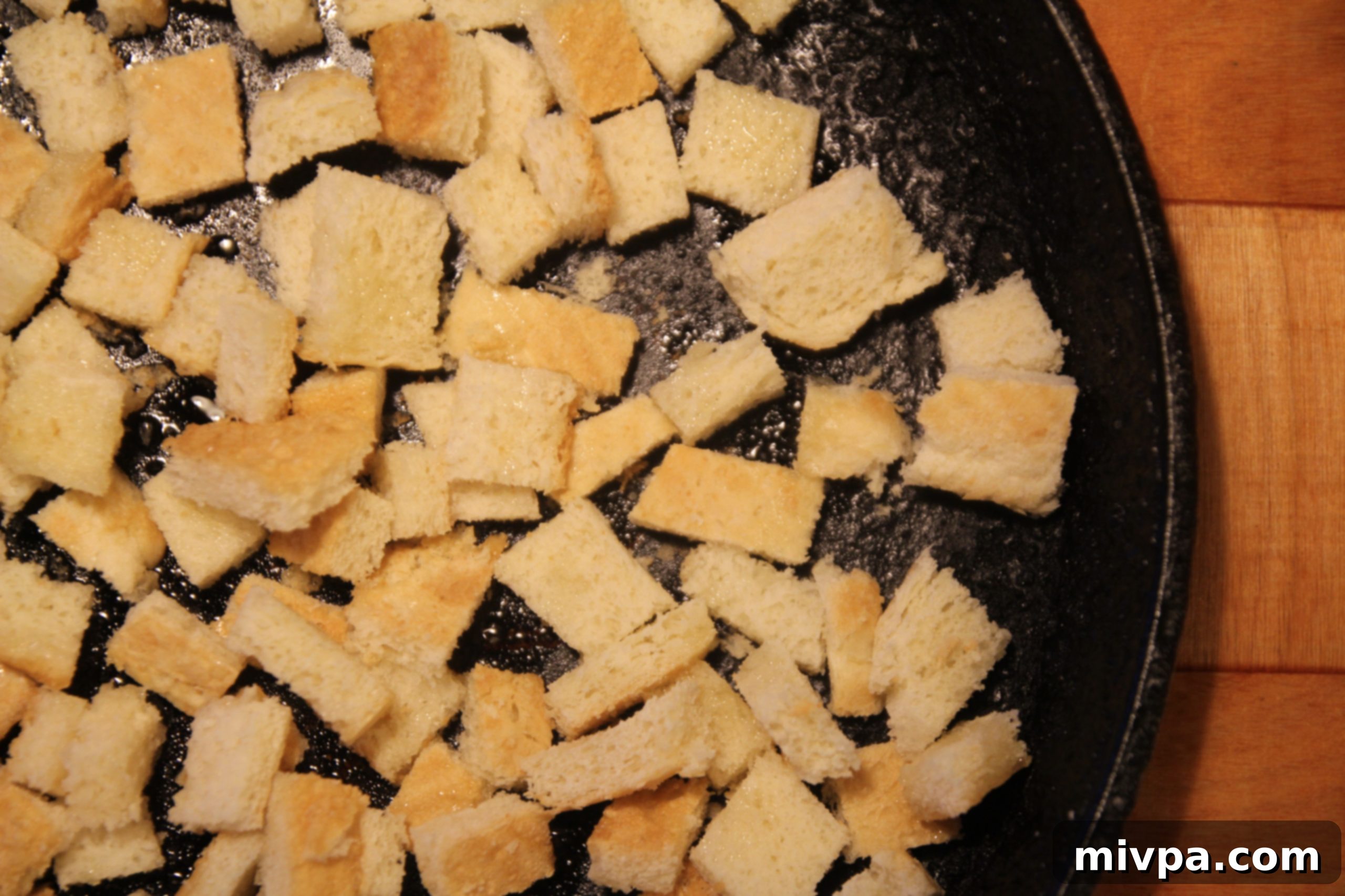 Homemade croutons, freshly toasted and golden brown, ready for a salad