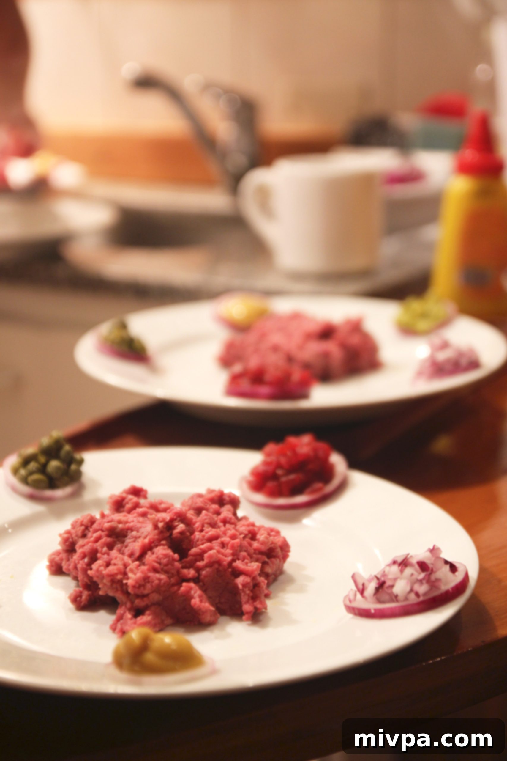 Steak Tartare close-up, highlighting the textures and colors