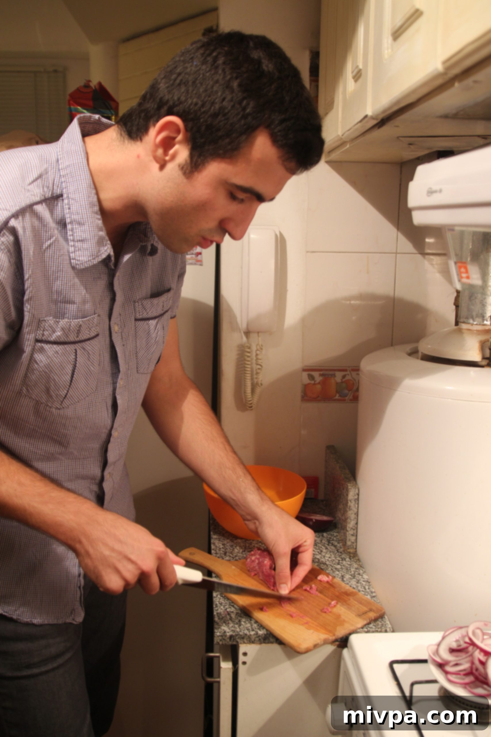 Michal meticulously shredding beef tenderloin for Steak Tartare