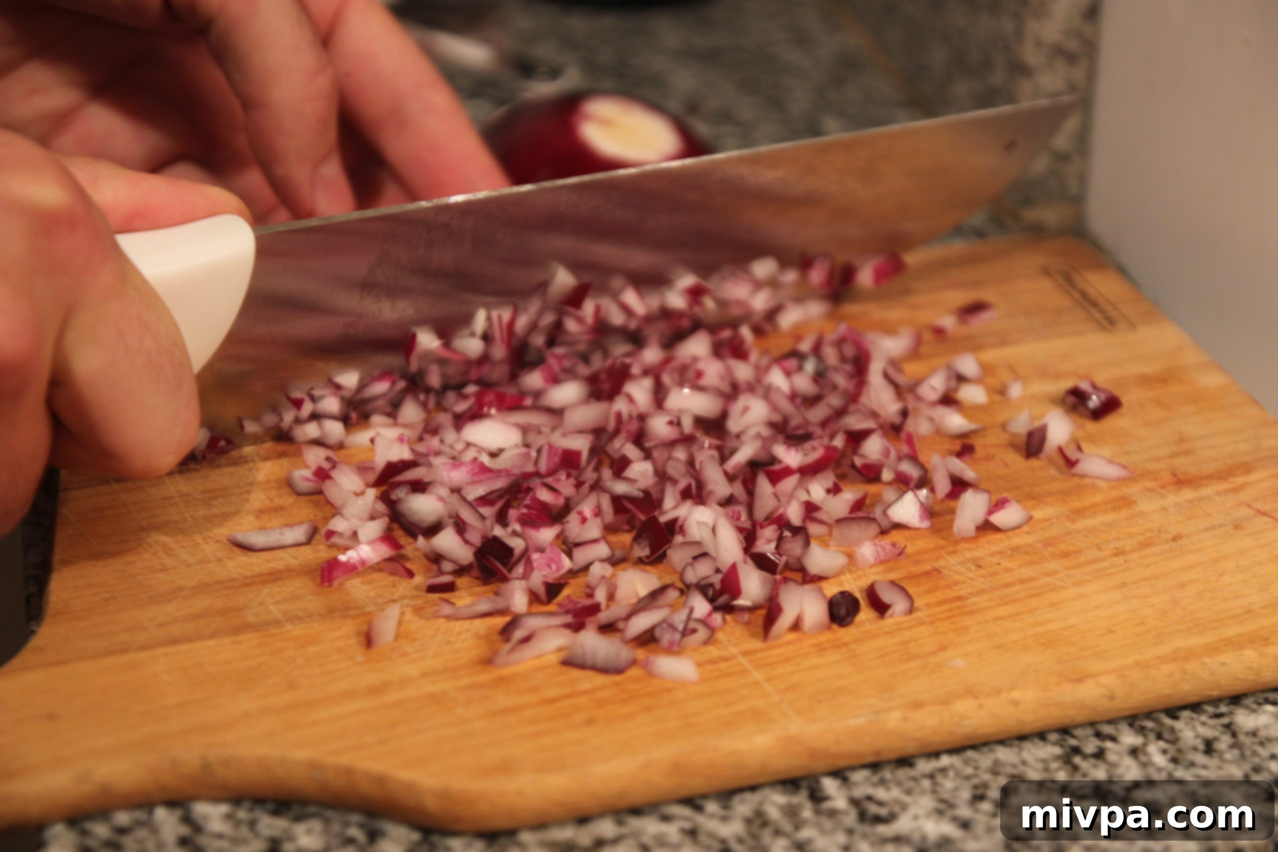 Close-up of the finely diced ingredients for Steak Tartare