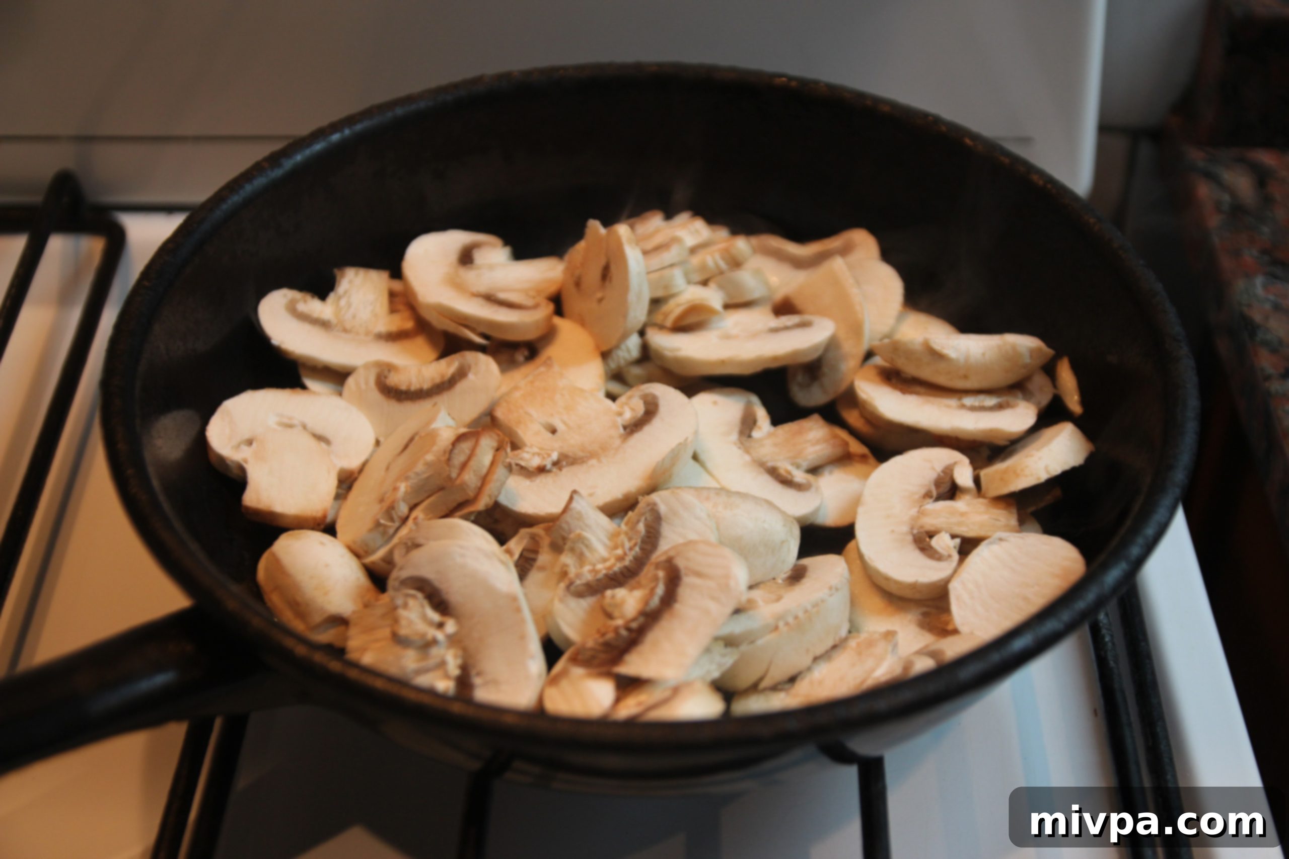 Sautéing mushrooms in olive oil