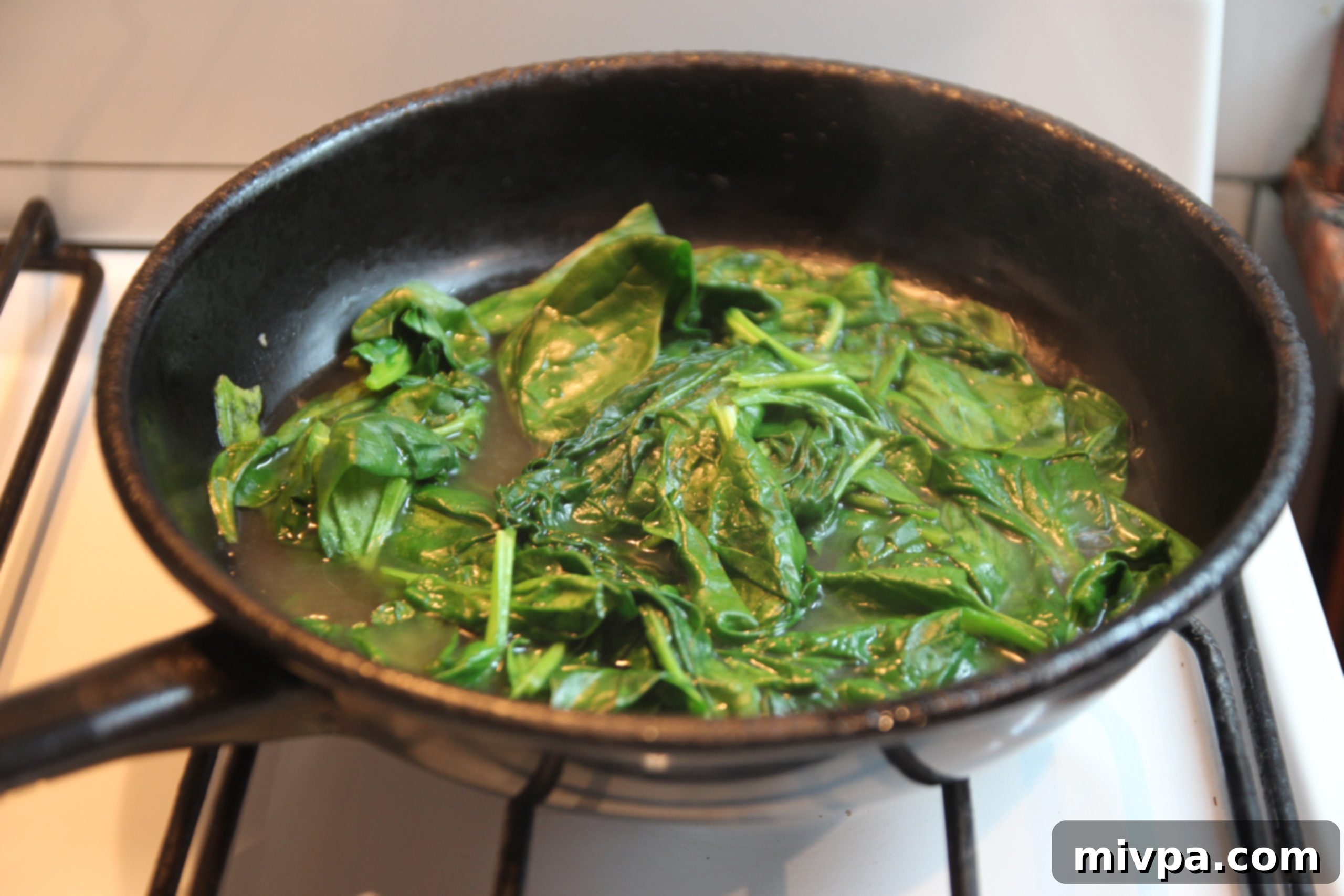 Drained wilted spinach