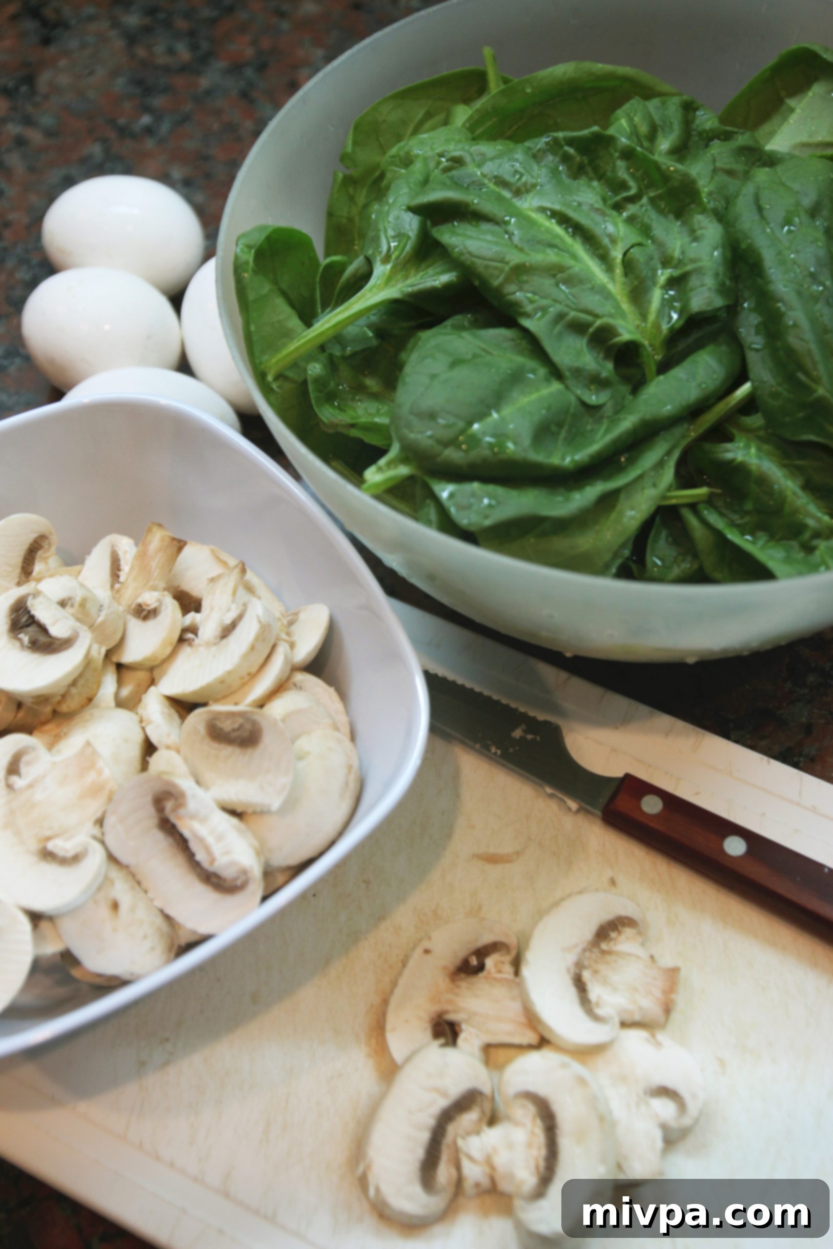 Close-up of baked Mushroom Spinach Quiche Cups