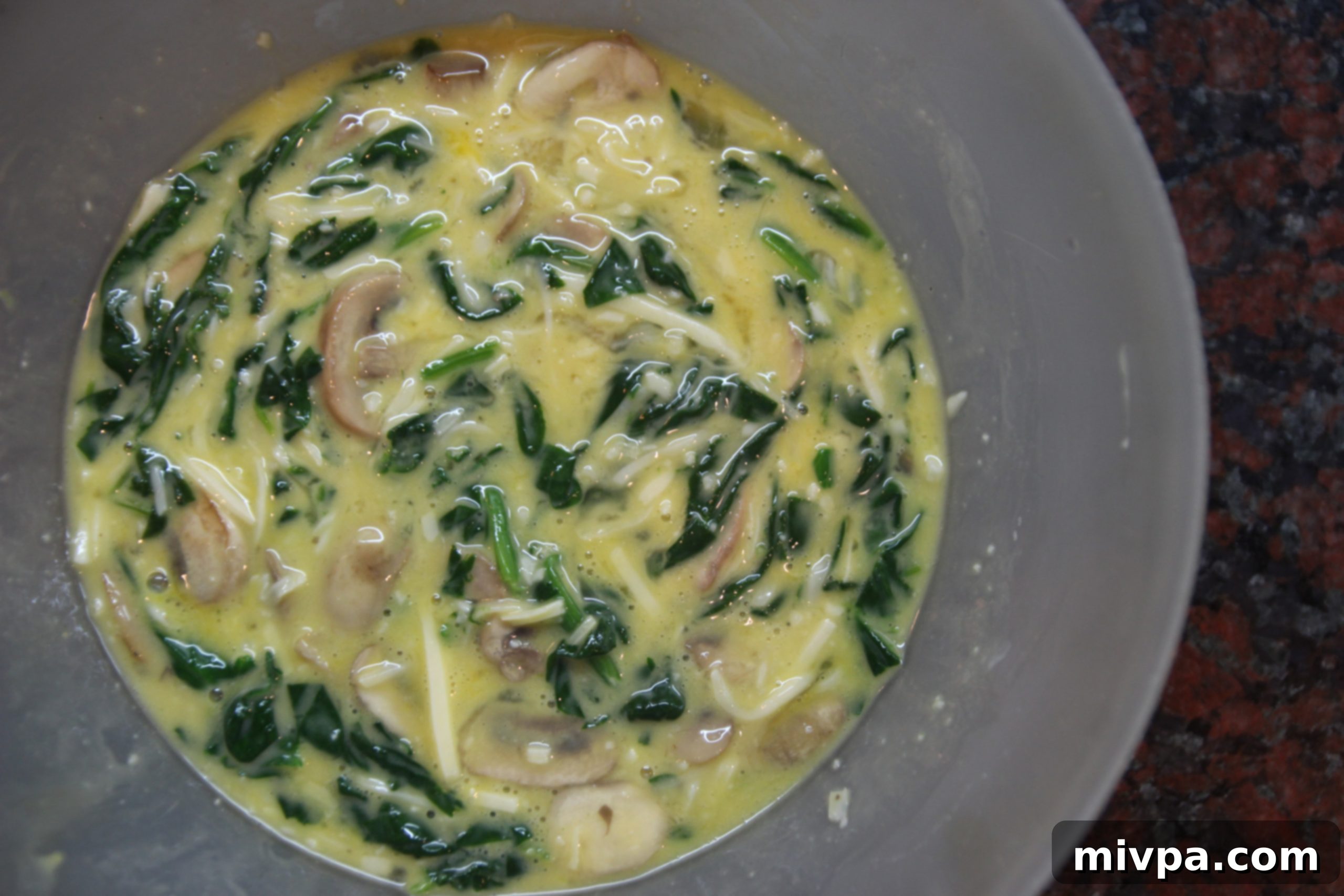 Homogeneous quiche mixture before baking