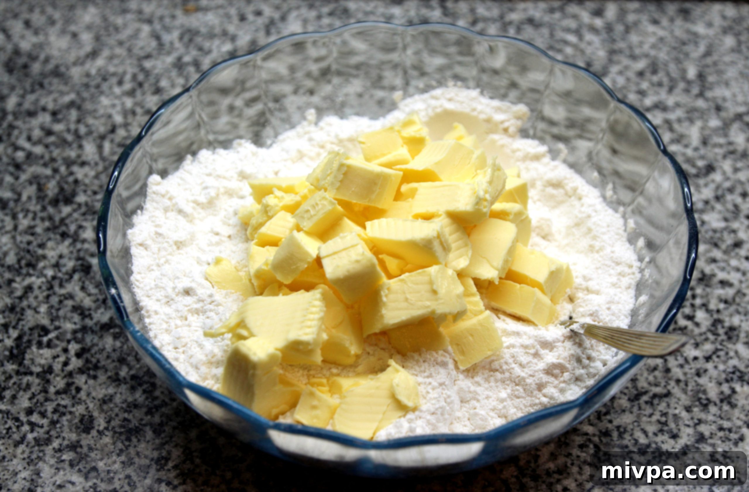 Adding cold butter to flour for tart dough