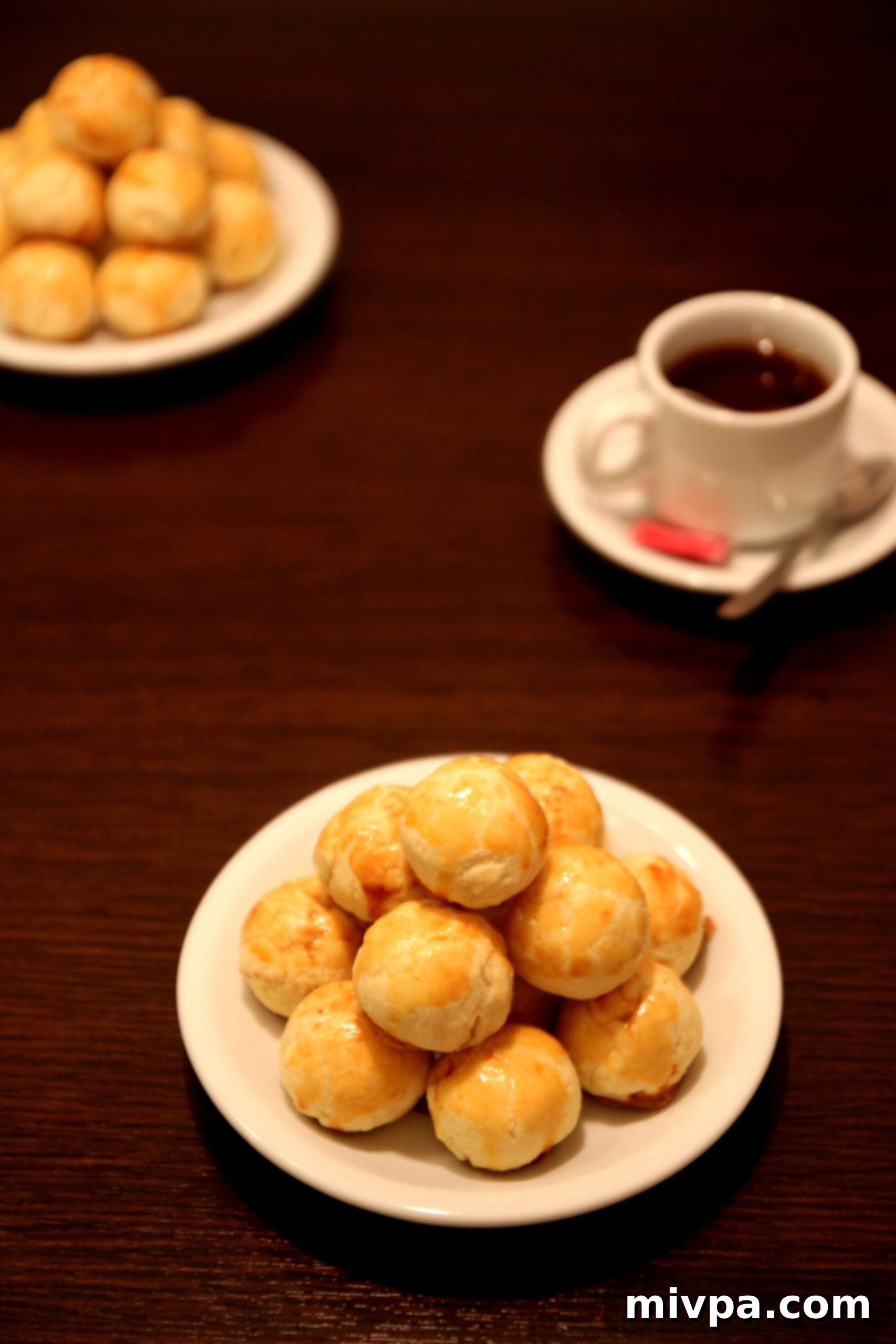 Shaping and glazing Pineapple Tarts for baking