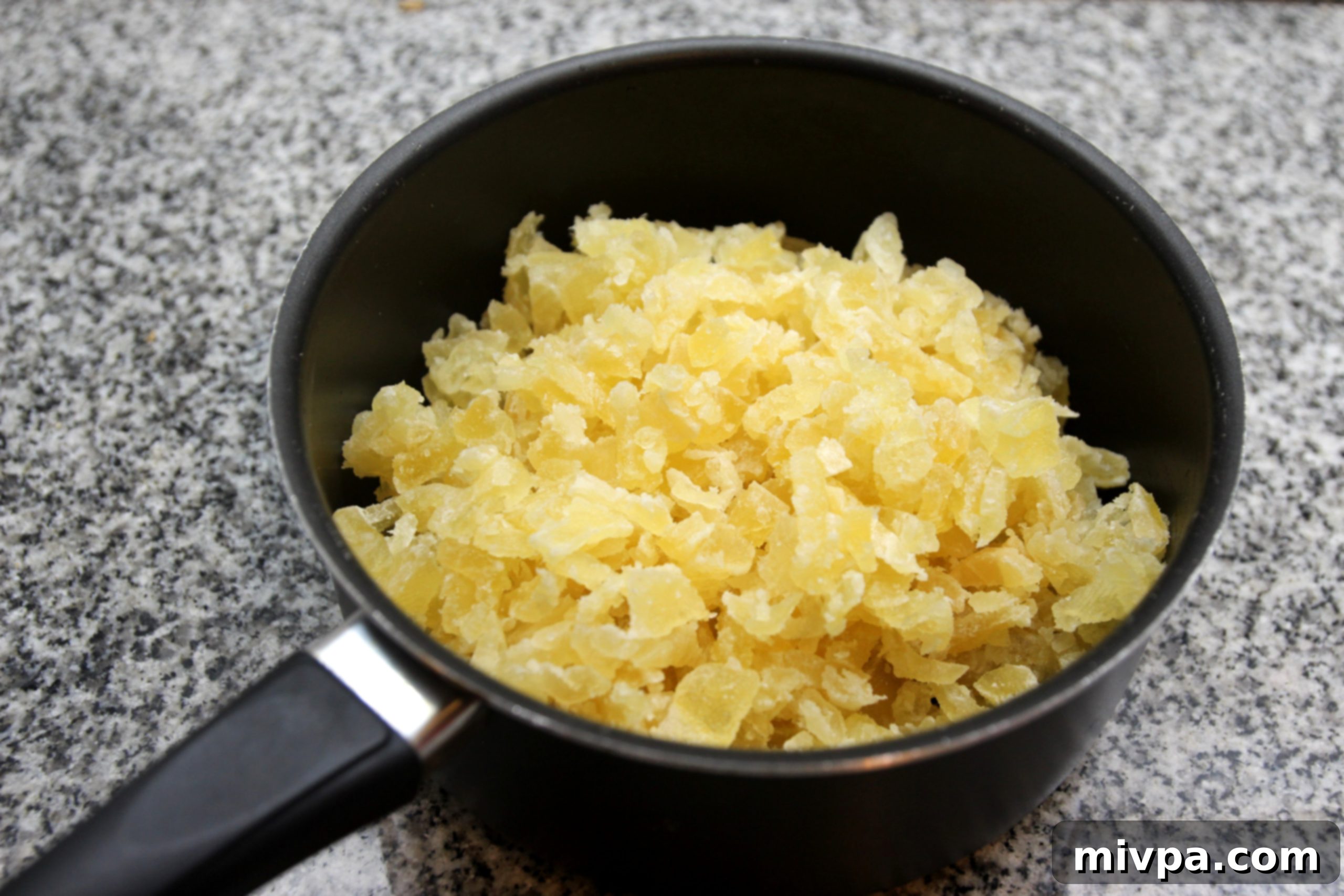 Cooking pineapple mixture in a pot