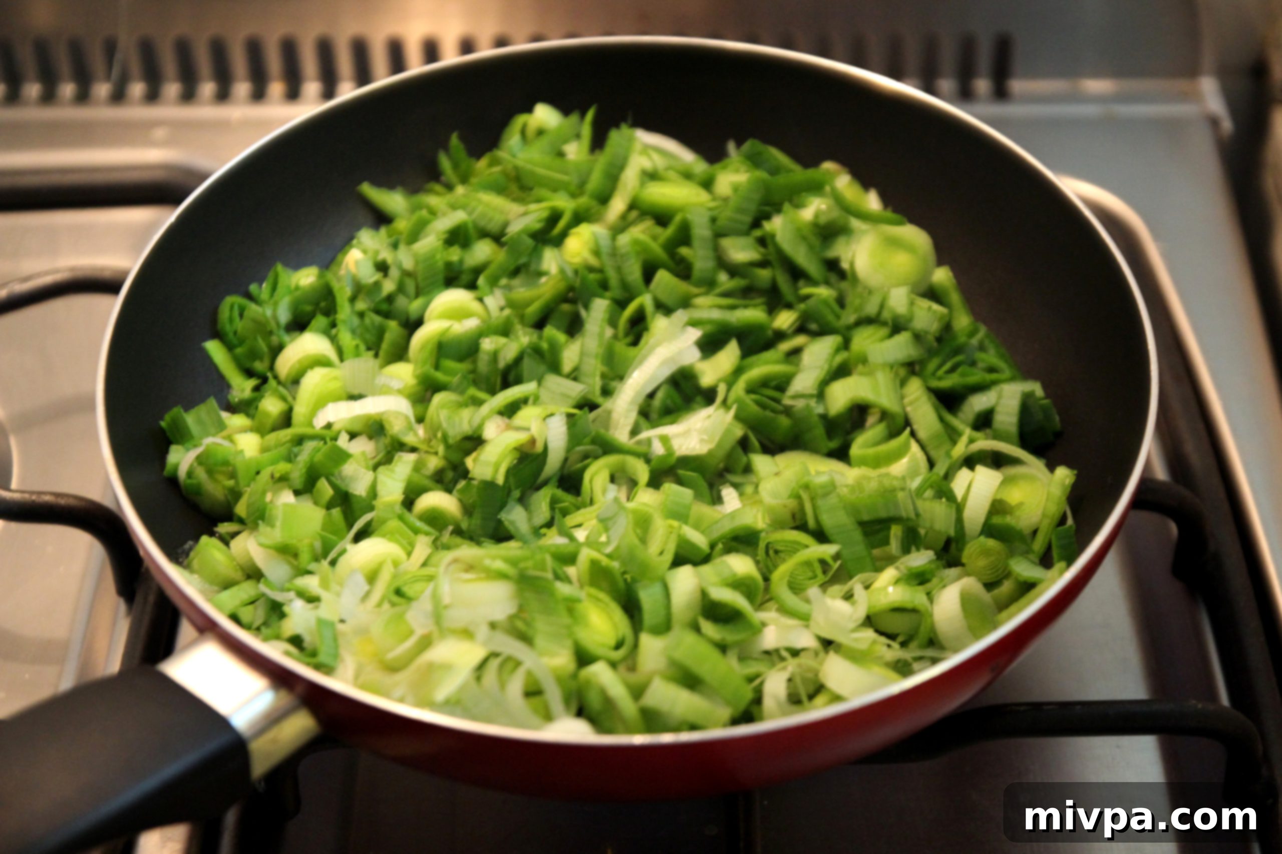 Sautéing chopped leeks in butter