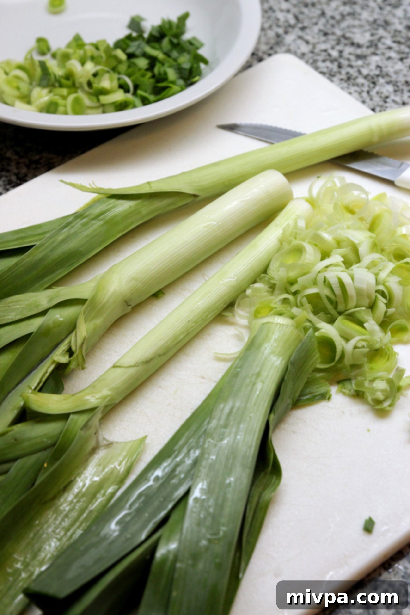 Sautéed leeks in a pan, ready for the tart