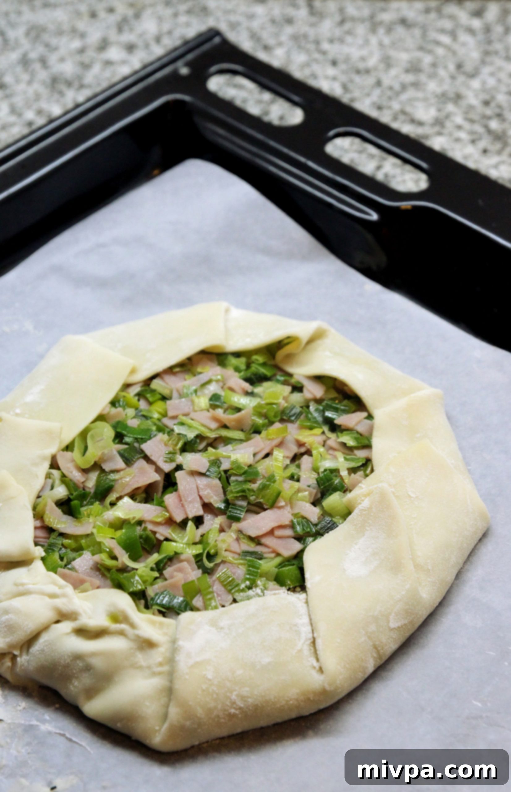 Close up of Leek and Ham Tart before baking