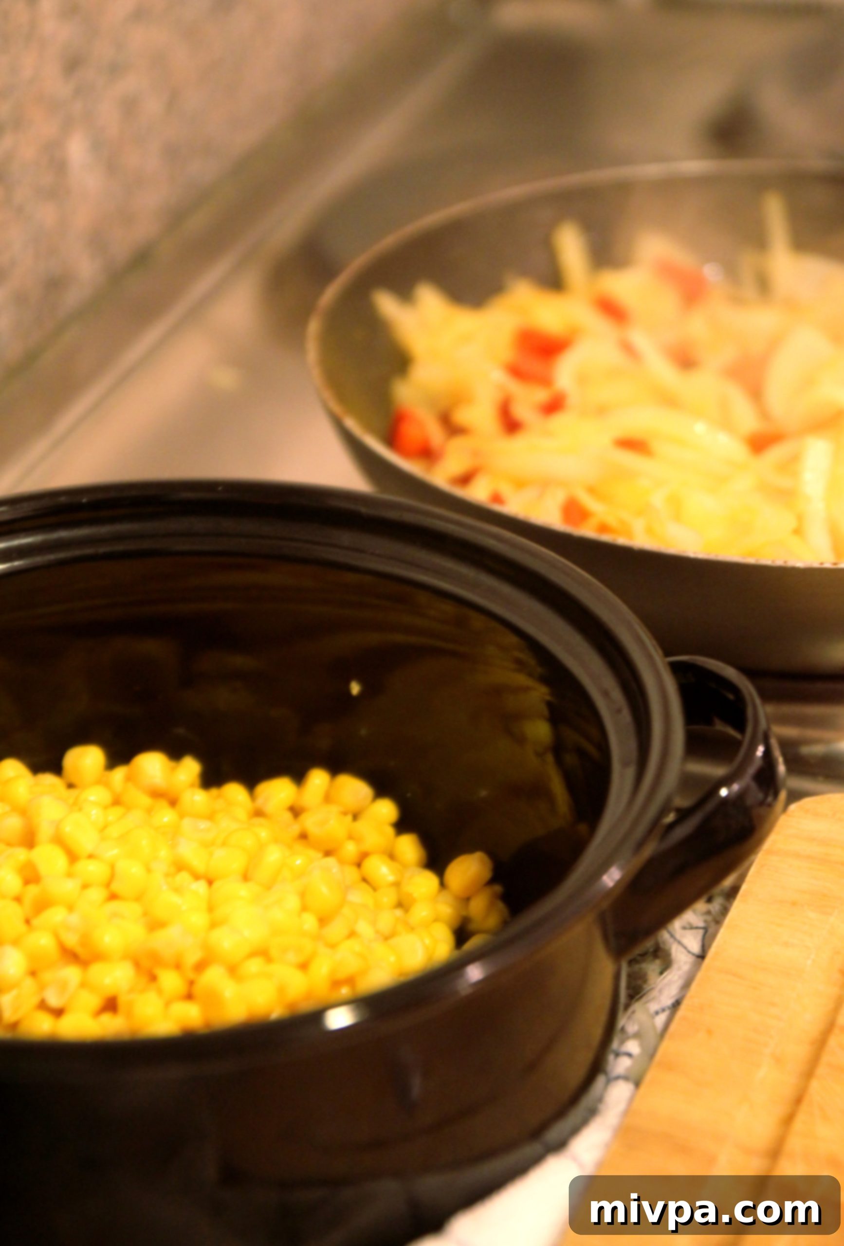 Mixing sweet corn tart ingredients