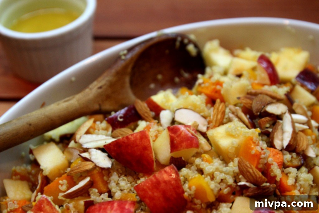 Serving the Apple, Butternut Squash and Quinoa Salad with dressing