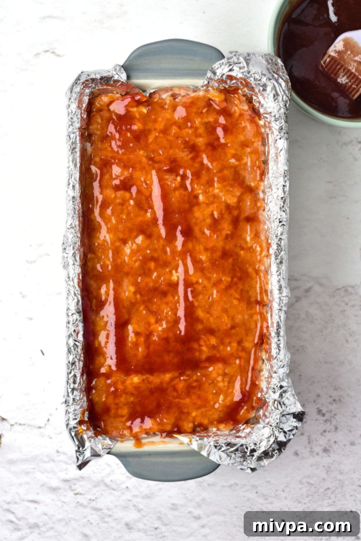 Gluten Dairy-Free Meatloaf Meat mixture spread with glaze