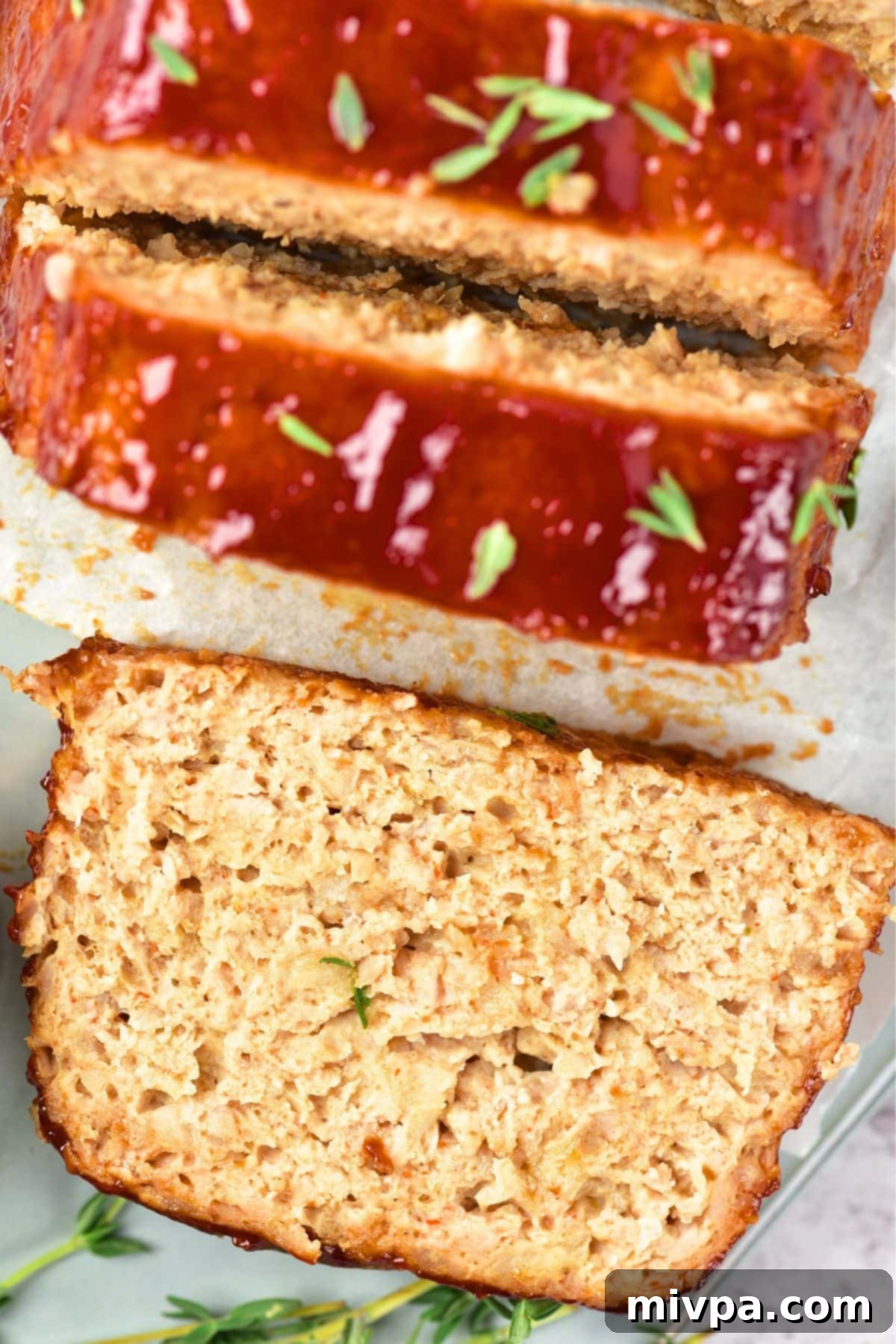 Meatloaf with Chicken Recipe (Gluten-Free, Dairy-Free) Top down view of a slice of meatloaf made with ground chicken meat