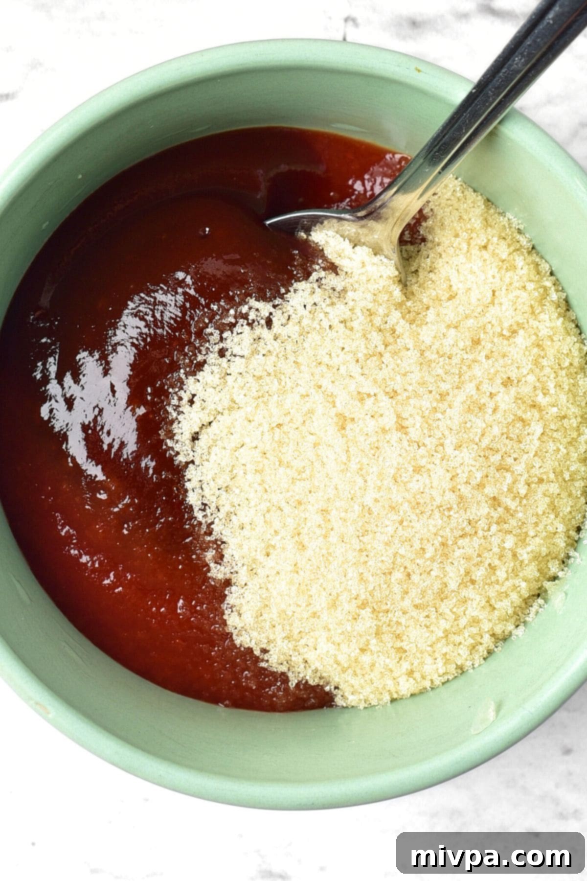 No-Fuss Gluten-Free Dairy-Free Chicken Meatloaf 2 Barbecue sauce, ketchup and brown sugar in bowl.