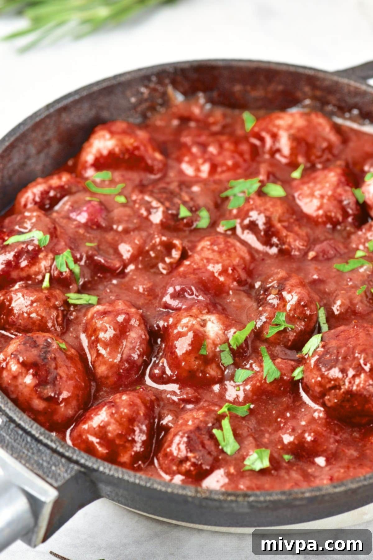 Gluten-Free Meatballs in Cranberry Sauce A skillet full of meatballs in cranberry sauce