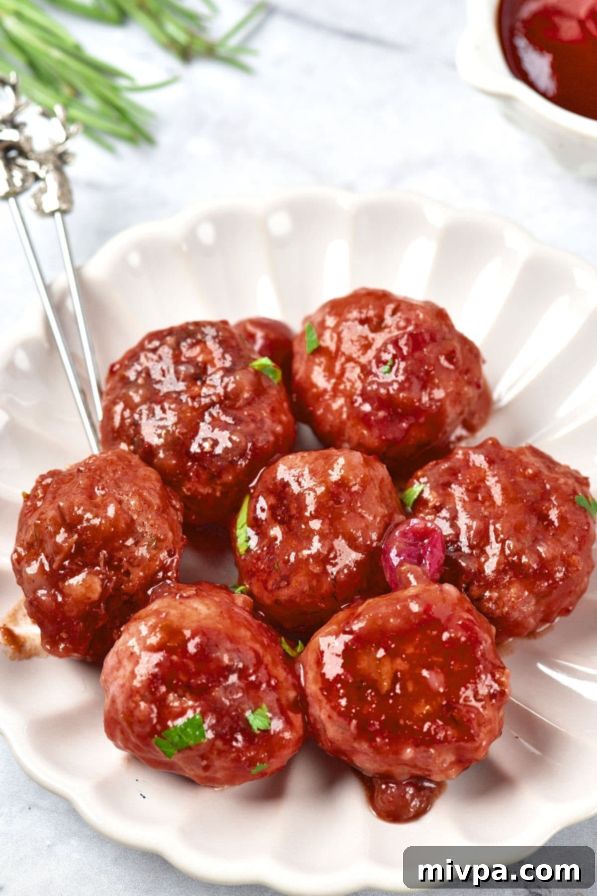 Meatballs in Cranberry Sauce A plate of meatballs in cranberry sauce