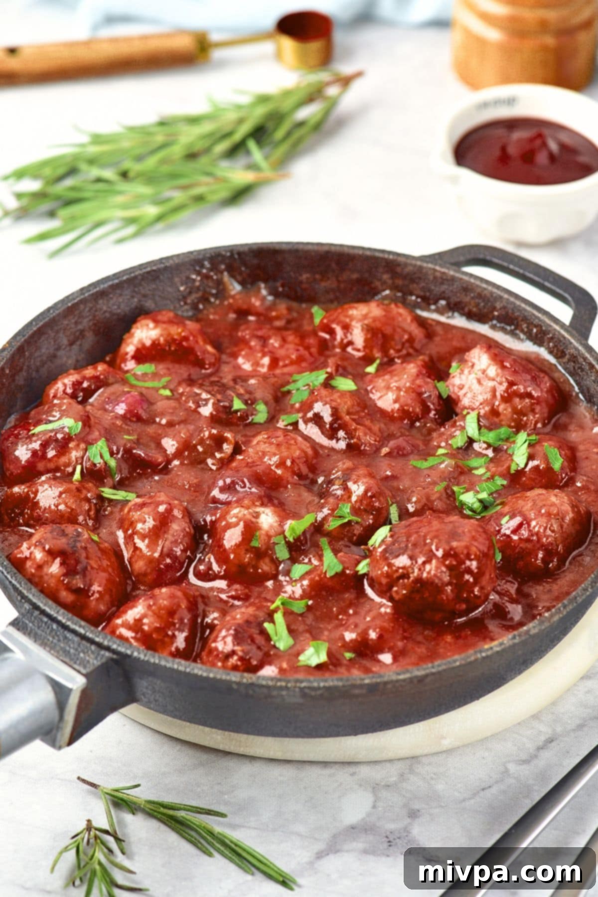 Gluten-Free Cranberry Meatballs Gluten-free cranberry meatballs in cast iron skillet
