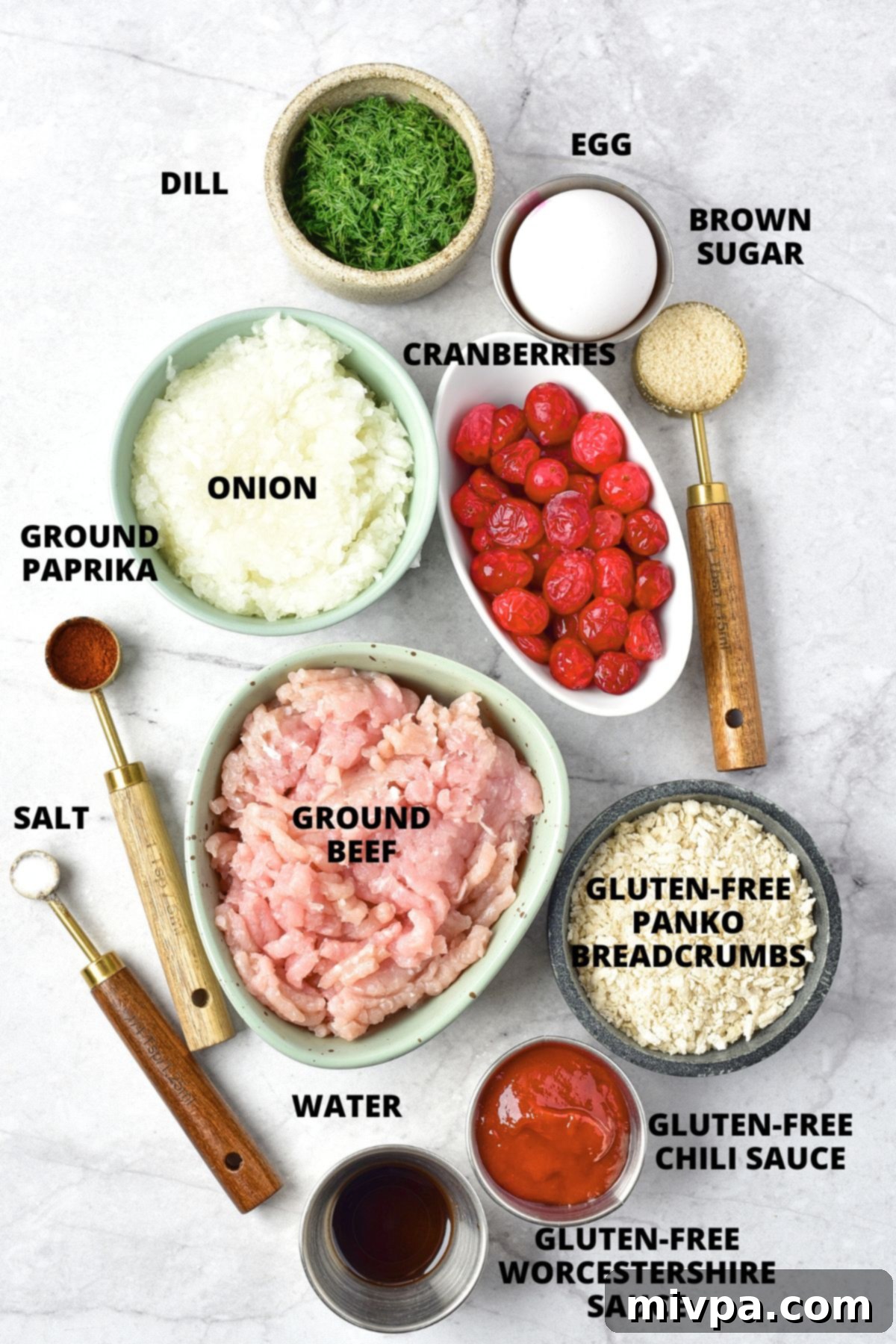 Cranberry Meatballs Recipe (Gluten-Free, Dairy-Free) Ingredients for cranberry meatballs recipe laid out on marble board.