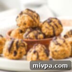 Peanut Butter Oat Fuel Bites (Gluten-Free & Vegan) 2 A plate full of peanut butter oatmeal balls