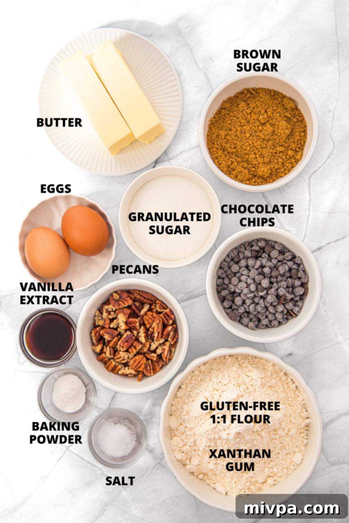 Brown Butter Pecan Chocolate Chip Cookies Recipe (Gluten-Free) All ingredients for gluten-free brown butter pecan chocolate chip cookies recipe meticulously laid out on a marble board.