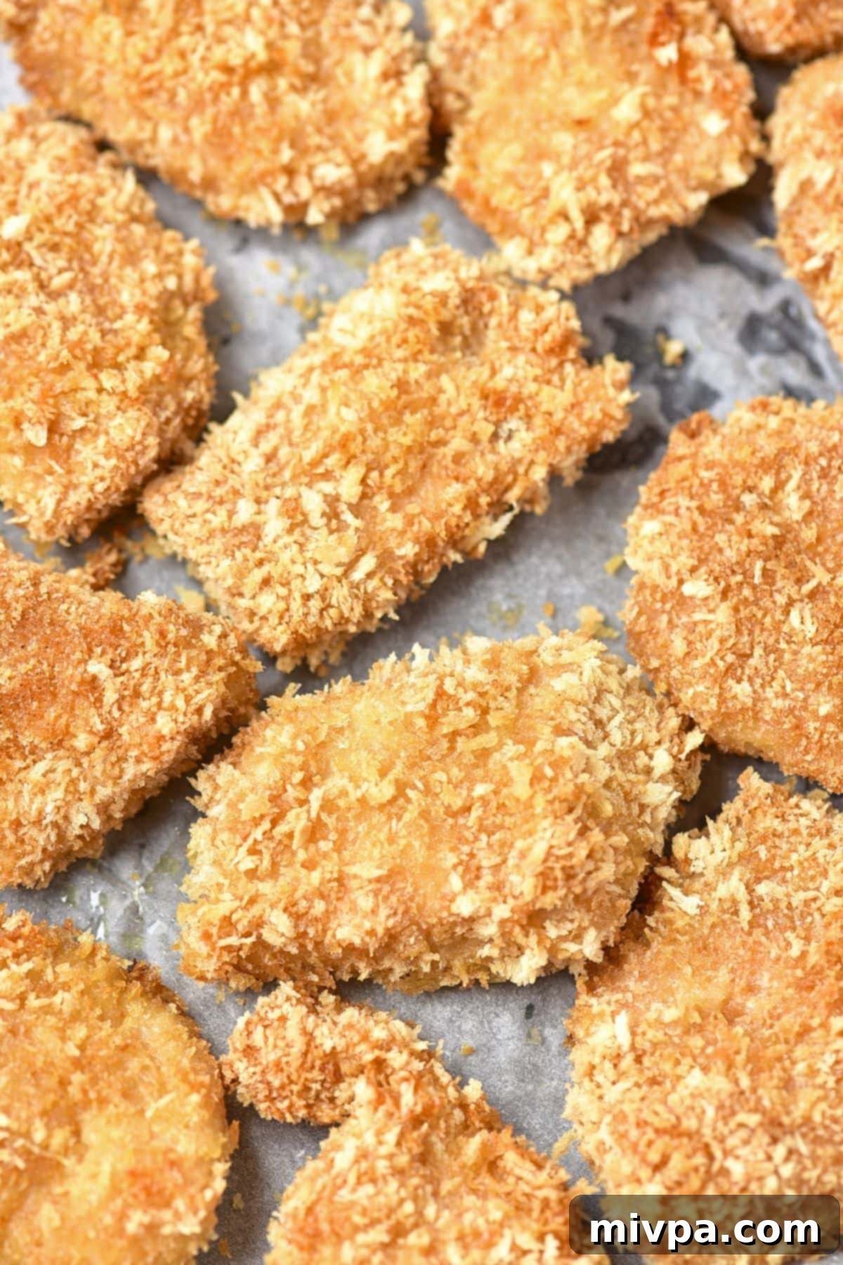 Homemade Turkey Nugget Recipe (Gluten-Free, Dairy-Free) Freshly baked turkey nuggets, golden brown and crispy.