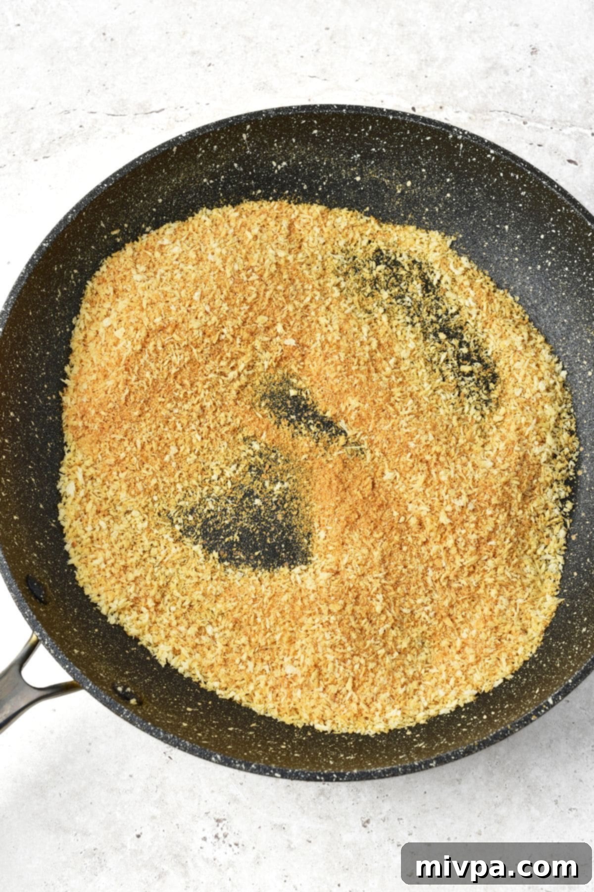 How to Make Turkey Nuggets Toasting panko breadcrumbs in a skillet over low heat.